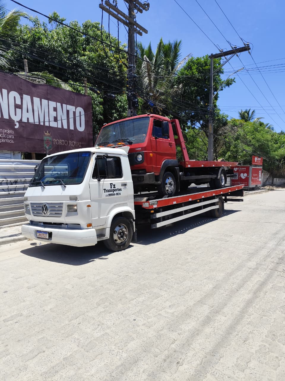 Guincho FZ transportando outro caminhão guincho